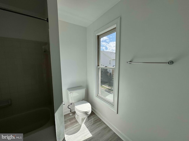 6325 Powder Flask Ct, Centreville, VA 20121 - full bathroom with toilet, wood finished floors, baseboards, and shower / tub combination