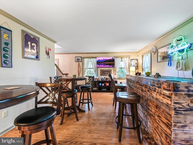 3622 Pricetown Rd, Fleetwood, PA 19522 - indoor dry bar with ornamental molding, wood finished floors, and stairway