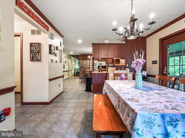 3622 Pricetown Rd, Fleetwood, PA 19522 - dining area featuring a chandelier, baseboards, recessed lighting, and ornamental molding