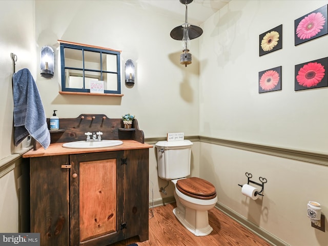 3622 Pricetown Rd, Fleetwood, PA 19522 - bathroom featuring toilet, wood finished floors, and vanity