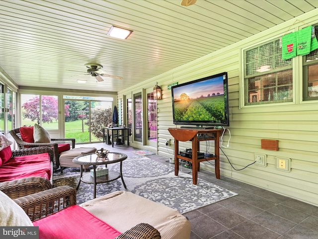 3622 Pricetown Rd, Fleetwood, PA 19522 - sunroom featuring a ceiling fan, an outdoor hangout area, tile patterned flooring, and wooden walls