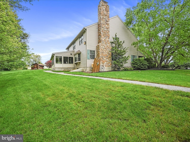 3622 Pricetown Rd, Fleetwood, PA 19522 - back of property with a chimney and a yard