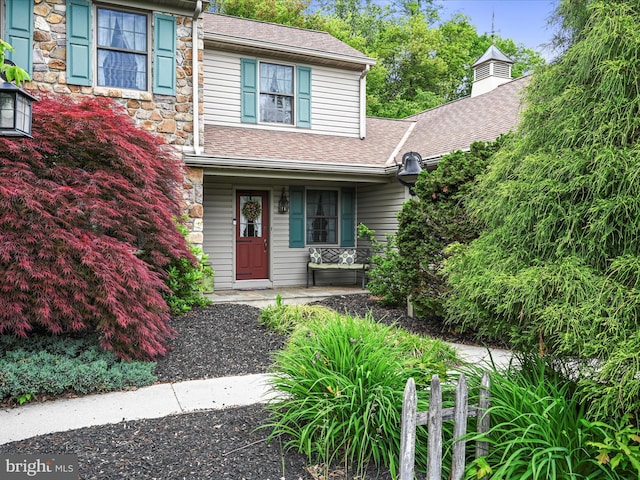 3622 Pricetown Rd, Fleetwood, PA 19522 - view of front of home with stone siding, roof with shingles, and covered porch