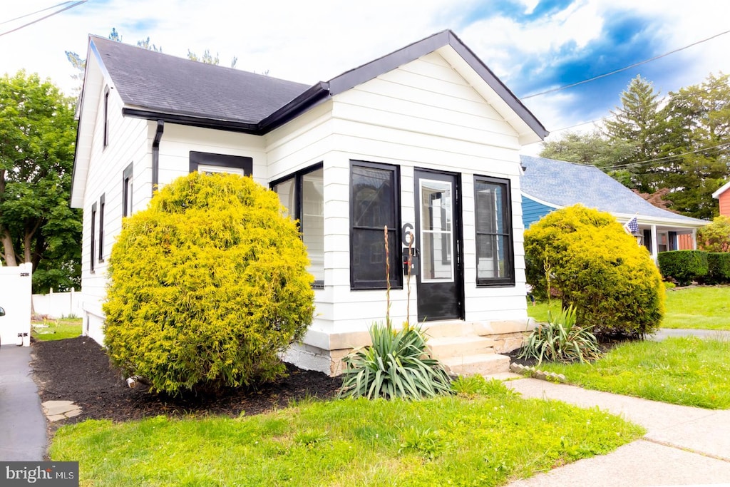 6 New Hillcrest Ave, Trenton, NJ 08638 - view of front of house with roof with shingles and entry steps