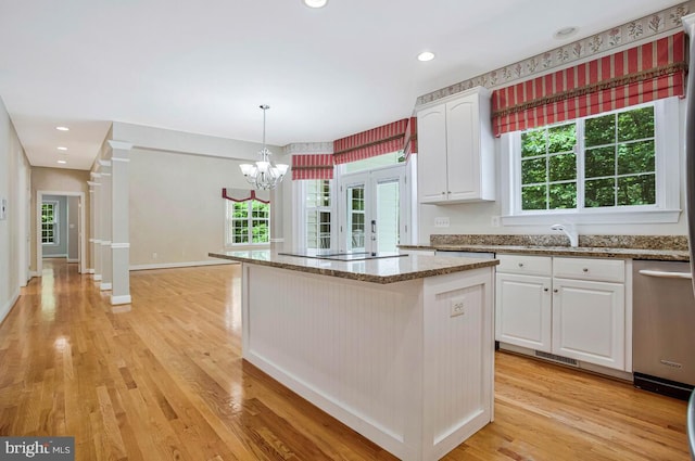 5257 Ferry Branch Ln, Lothian, MD 20711 - kitchen with a sink, light stone countertops, white cabinetry, light wood-style floors, and recessed lighting