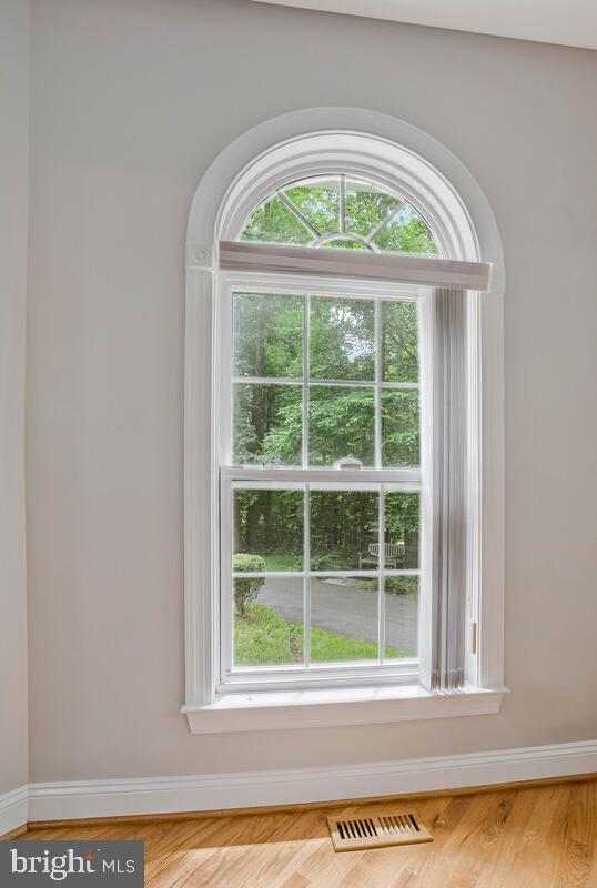 5257 Ferry Branch Ln, Lothian, MD 20711 - detailed view of baseboards and wood finished floors