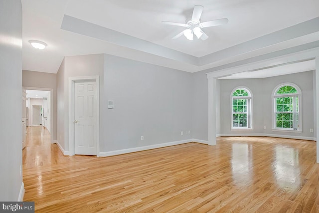 5257 Ferry Branch Ln, Lothian, MD 20711 - empty room featuring light wood-style floors, a ceiling fan, and baseboards