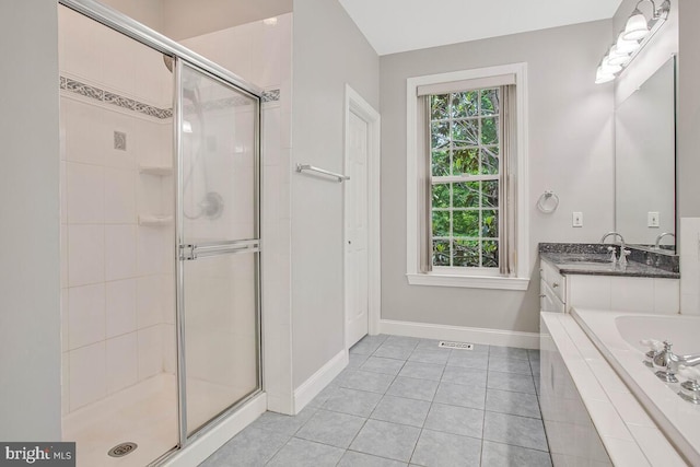 5257 Ferry Branch Ln, Lothian, MD 20711 - bathroom featuring a stall shower, baseboards, and tile patterned flooring