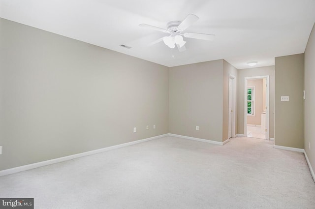 5257 Ferry Branch Ln, Lothian, MD 20711 - empty room featuring a ceiling fan, baseboards, and light colored carpet