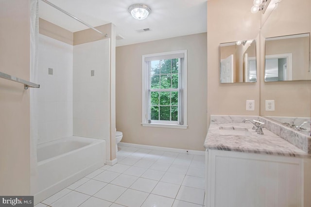 5257 Ferry Branch Ln, Lothian, MD 20711 - full bath with toilet, double vanity, tile patterned floors, bathing tub / shower combination, and baseboards