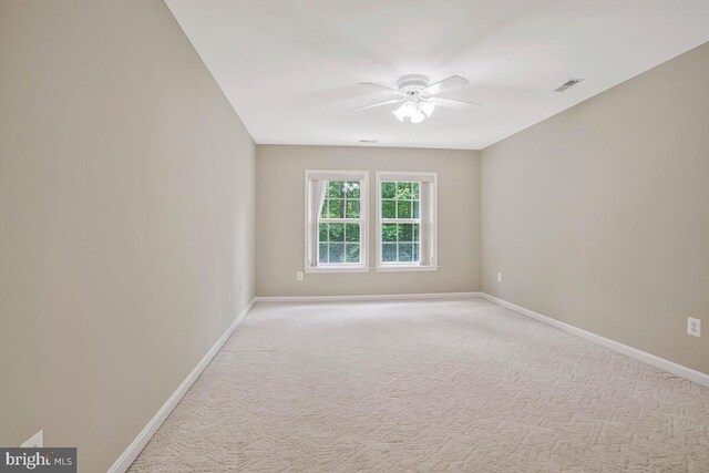 5257 Ferry Branch Ln, Lothian, MD 20711 - unfurnished room with a ceiling fan, baseboards, and light carpet