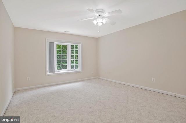 5257 Ferry Branch Ln, Lothian, MD 20711 - spare room featuring carpet, baseboards, and a ceiling fan