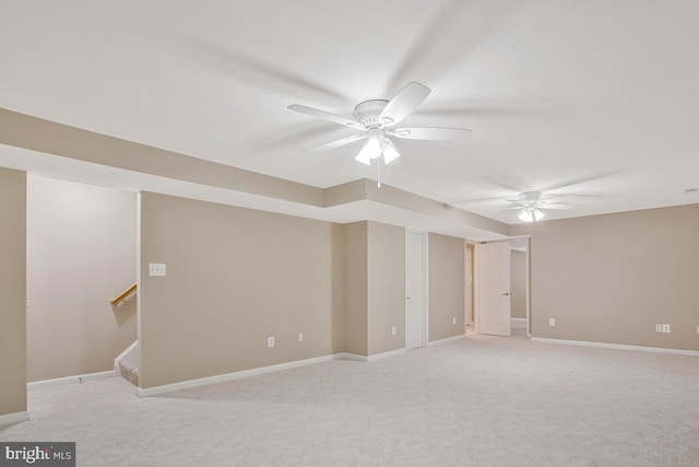 5257 Ferry Branch Ln, Lothian, MD 20711 - empty room featuring a ceiling fan, stairway, light carpet, and baseboards