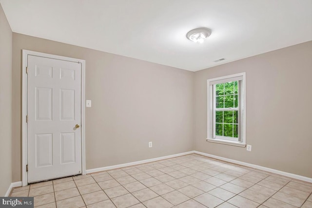 5257 Ferry Branch Ln, Lothian, MD 20711 - unfurnished room with baseboards and light tile patterned floors