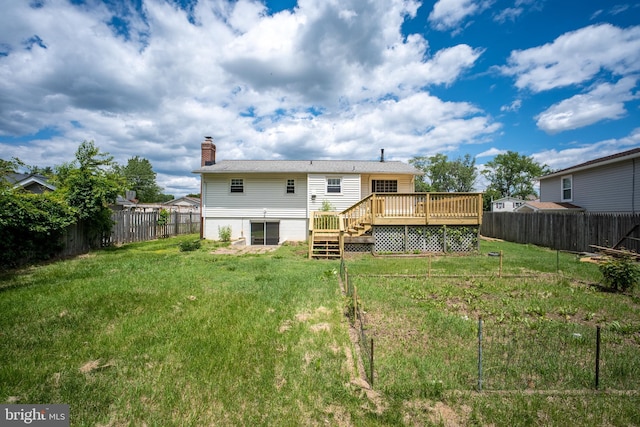 807 Fulton Pl, Woodbridge, VA 22191 - rear view of property featuring a wooden deck and a chimney
