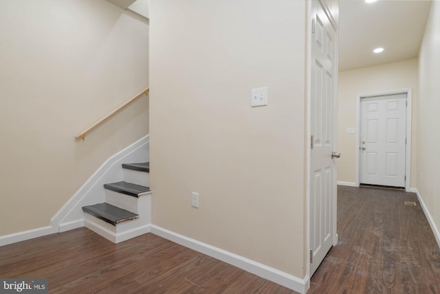 1839 Ramsay St, Baltimore, MD 21223 - hallway with dark wood-style floors, baseboards, stairs, and recessed lighting