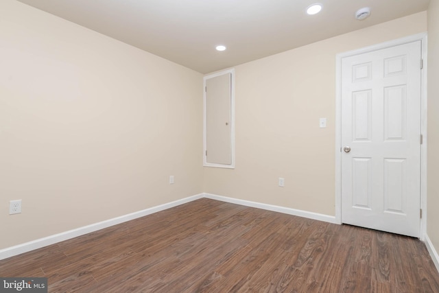 1839 Ramsay St, Baltimore, MD 21223 - unfurnished room featuring wood finished floors, baseboards, a smoke detector, and recessed lighting