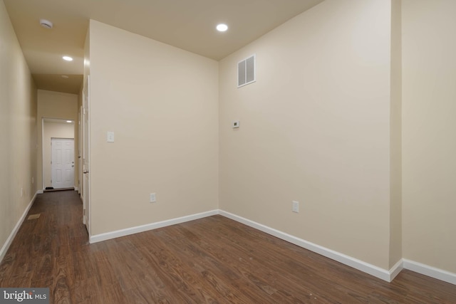 1839 Ramsay St, Baltimore, MD 21223 - spare room with baseboards, dark wood-type flooring, and recessed lighting