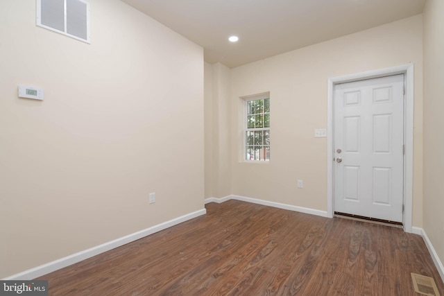 1839 Ramsay St, Baltimore, MD 21223 - spare room with dark wood finished floors, baseboards, and recessed lighting