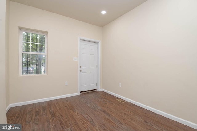 1839 Ramsay St, Baltimore, MD 21223 - unfurnished room featuring dark wood-style floors, baseboards, and recessed lighting