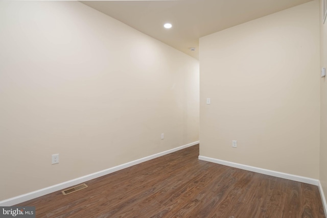 1839 Ramsay St, Baltimore, MD 21223 - unfurnished room with baseboards, dark wood-style floors, and recessed lighting
