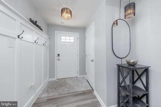 33 Burr St, Williamstown, NJ 08094 - entrance foyer featuring light wood-style flooring, a chandelier, and baseboards