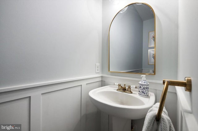 47 Orleans Dr, Shepherdstown, WV 25443 - bathroom featuring wainscoting and a decorative wall