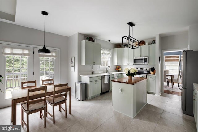 47 Orleans Dr, Shepherdstown, WV 25443 - kitchen with appliances with stainless steel finishes, wooden counters, healthy amount of natural light, and a center island