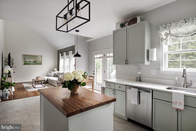 47 Orleans Dr, Shepherdstown, WV 25443 - kitchen featuring stainless steel dishwasher, butcher block countertops, healthy amount of natural light, lofted ceiling, and a sink