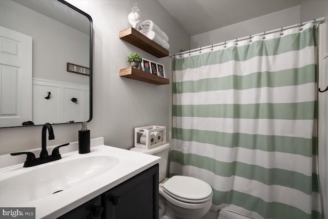 47 Orleans Dr, Shepherdstown, WV 25443 - bathroom featuring toilet, vanity, and curtained shower