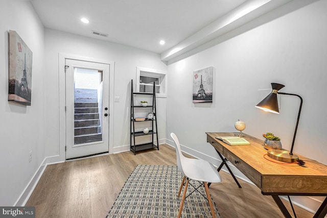 office with wood finished floors, baseboards, and recessed lighting