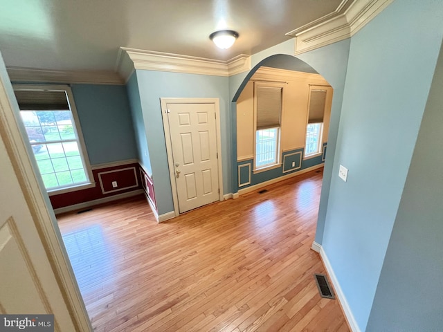 126 Greenway St, Fredericksburg, VA 22405 - empty room with arched walkways, light wood-type flooring, ornamental molding, and baseboards