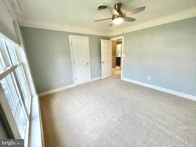 126 Greenway St, Fredericksburg, VA 22405 - unfurnished bedroom featuring crown molding, carpet flooring, baseboards, a closet, and ceiling fan