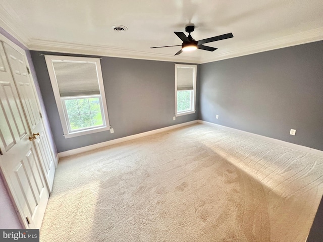 126 Greenway St, Fredericksburg, VA 22405 - unfurnished bedroom with light carpet, multiple windows, crown molding, baseboards, and ceiling fan