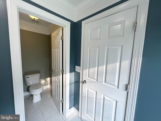 126 Greenway St, Fredericksburg, VA 22405 - bathroom with crown molding, toilet, tile patterned floors, and baseboards