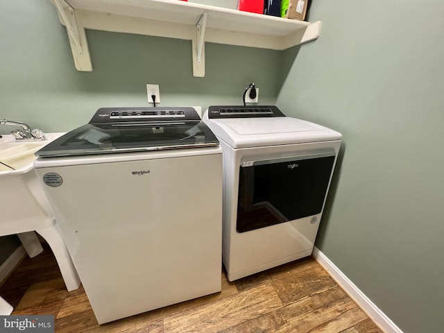 126 Greenway St, Fredericksburg, VA 22405 - laundry room with washer and dryer and wood finished floors