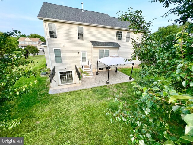 126 Greenway St, Fredericksburg, VA 22405 - rear view of property with a patio, a lawn, and entry steps
