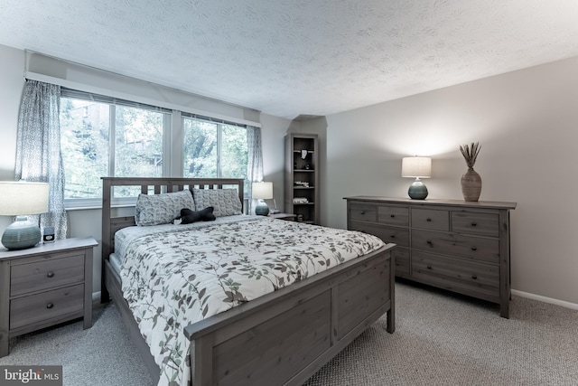 7414 Golden Horseshoe Ct, Springfield, VA 22153 - bedroom with light colored carpet and a textured ceiling