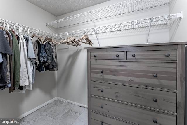 7414 Golden Horseshoe Ct, Springfield, VA 22153 - spacious closet featuring light marble finish floors