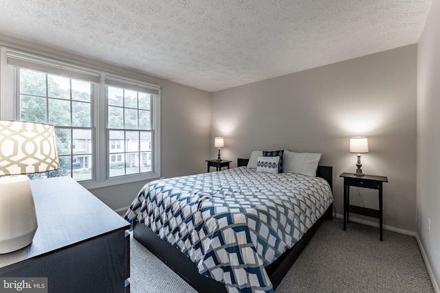 7414 Golden Horseshoe Ct, Springfield, VA 22153 - carpeted bedroom with baseboards and a textured ceiling