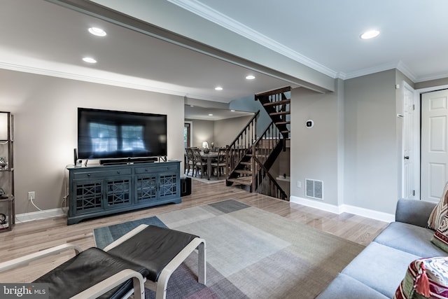 7414 Golden Horseshoe Ct, Springfield, VA 22153 - living area featuring stairs, wood finished floors, ornamental molding, and recessed lighting