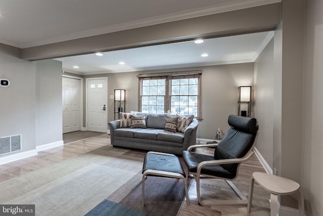 7414 Golden Horseshoe Ct, Springfield, VA 22153 - living room with wood finished floors, recessed lighting, and ornamental molding