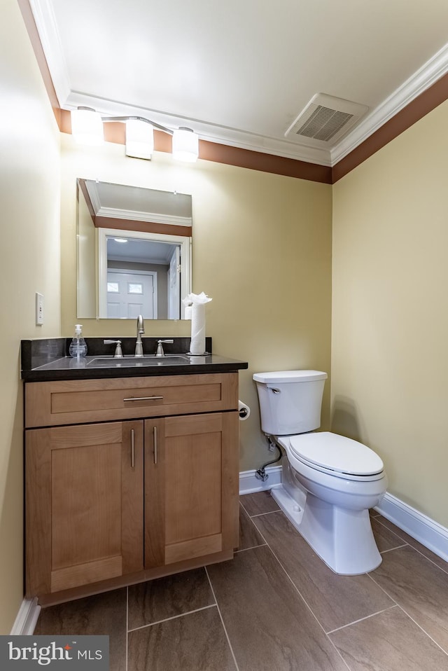 7414 Golden Horseshoe Ct, Springfield, VA 22153 - bathroom with ornamental molding and vanity