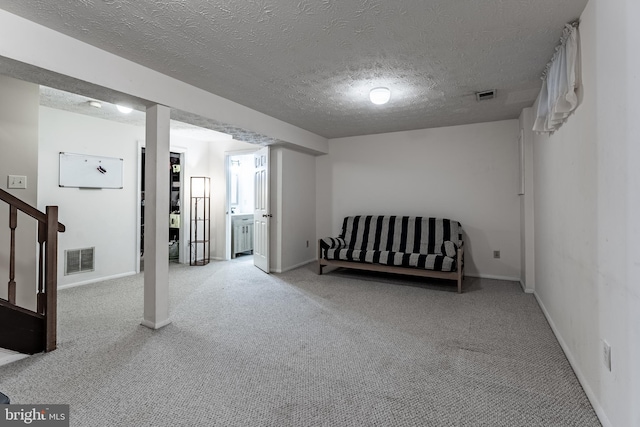7414 Golden Horseshoe Ct, Springfield, VA 22153 - finished basement featuring carpet, a textured ceiling, and stairway