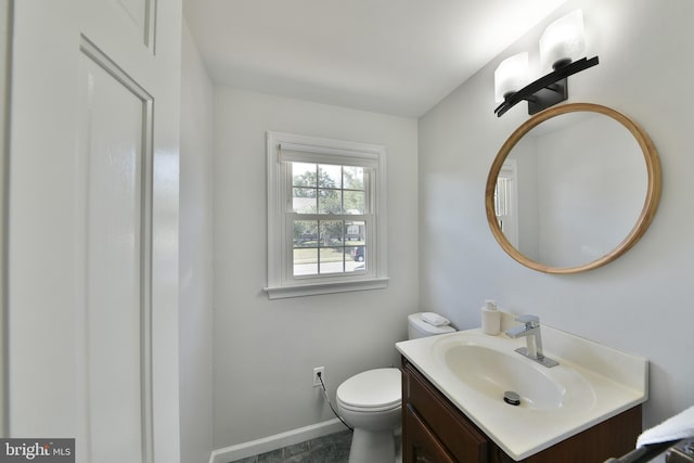 100 Shenandoah Rd, Cinnaminson, NJ 08077 - half bathroom with vanity, baseboards, and toilet