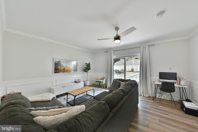 100 Shenandoah Rd, Cinnaminson, NJ 08077 - living room with ceiling fan, wood finished floors, ornamental molding, and a wainscoted wall
