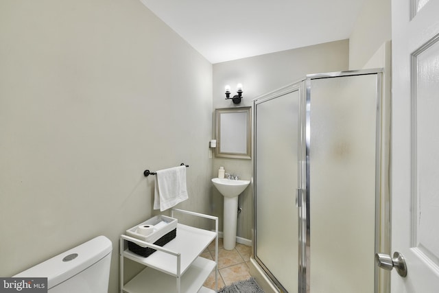 100 Shenandoah Rd, Cinnaminson, NJ 08077 - bathroom with tile patterned floors, a shower stall, and toilet