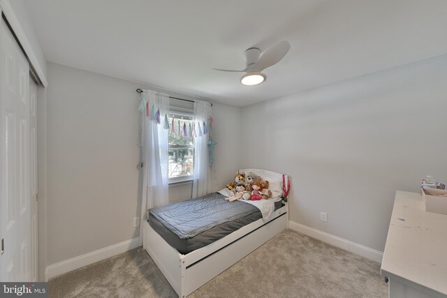100 Shenandoah Rd, Cinnaminson, NJ 08077 - bedroom featuring light carpet, a closet, baseboards, and ceiling fan