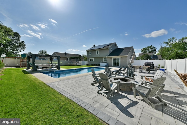 100 Shenandoah Rd, Cinnaminson, NJ 08077 - view of pool featuring an outdoor fire pit, a playground, and a patio area