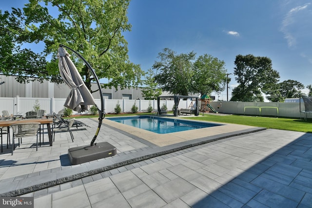 100 Shenandoah Rd, Cinnaminson, NJ 08077 - view of swimming pool with a trampoline, a patio area, a playground, and outdoor dining space